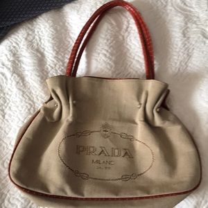 PRADA Purse Material & red leather straps. See pictures. Selling as is
